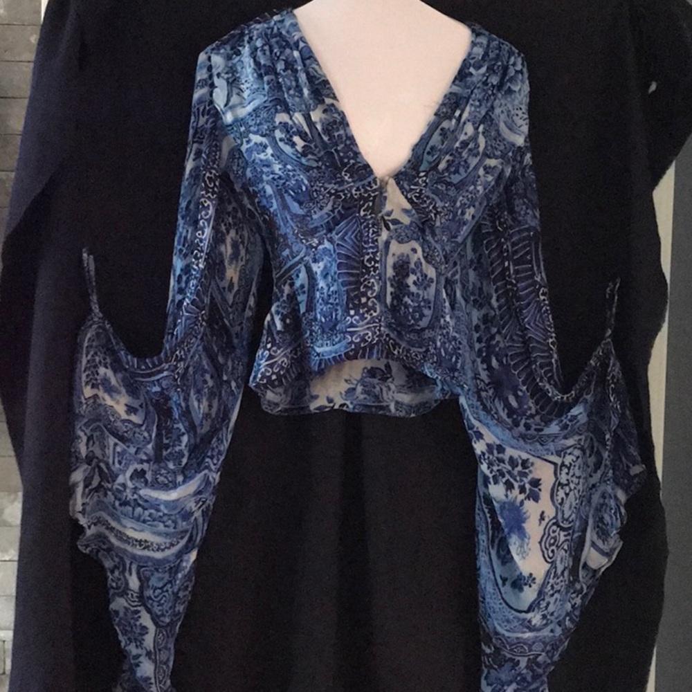 Silk printed Roberto Cavalli blouse.